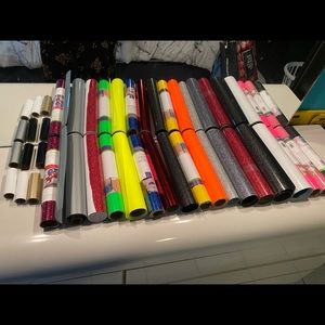 18 large rolls of HTV vinyl and 6 small rolls